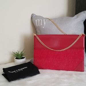 Authentic Yves Saint Laurent clutch bag in red